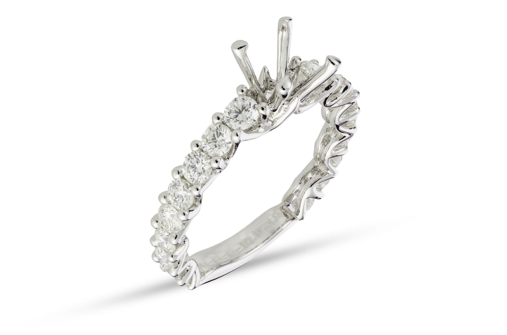 Shared Prong Set Engagement Ring