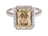 Radiant Yellow Diamond and White Round Diamond Ring